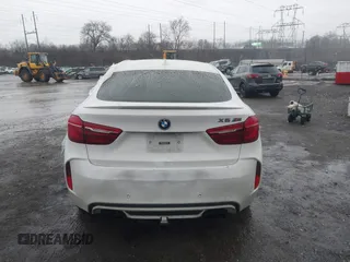 2016 BMW X6 M with VIN 5YMKW8C50G0R43150, listed as a IAAI auction lot 41463258 with 81,202 mi miles. Bid and sale history available at carsss.com. Image 16.