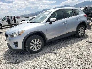 2016 Mazda CX-5 Sport with VIN JM3KE4BY9G0653402, listed as a Copart auction lot 61871275 with 80,790 mi miles and Salvage title. Bid and sale history available at DreamBid. Image 1.
