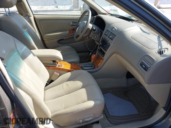 2003 Infiniti I35 Luxury z VIN JNKDA31A23T104434, wystawiony jako IAAI lot #41821043 z przebiegiem 146 903 mil mil oraz . Historia ofert i sprzedaży dostępna na DreamBid. Obrazek 5.