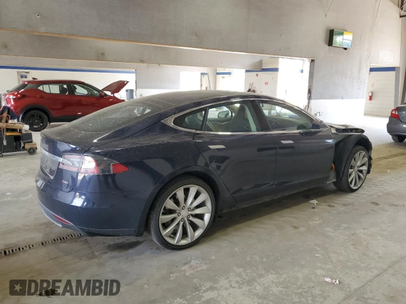 2014 Tesla Model S 60 with VIN 5YJSA1H10EFP52850, listed as a Copart auction lot 54321805 with 58,031 mi miles and Salvage Title. Bid and sale history available at DreamBid. Image 3.