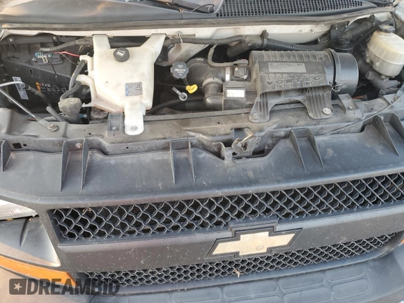 2016 Chevrolet Express Cargo with VIN 1GCWGAFF1G1124774, listed as a Copart auction lot 83574214 with 270,050 mi miles and Salvage title. Bid and sale history available at DreamBid. Image 12.
