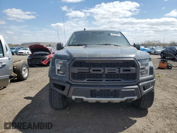 2020 Ford F-150 Raptor with VIN 1FTFW1RG3LFC73188, listed as a Copart auction lot 52573455 with 99,198 mi miles and Salvage Title. Bid and sale history available at carsss.com. Image 5.