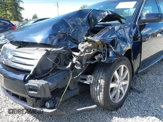 2008 Ford Taurus SEL with VIN 1FAHP24W98G140677, listed as a IAAI auction lot 42087217 with 151,693 mi miles. Bid and sale history available at carsss.com. Image 6.