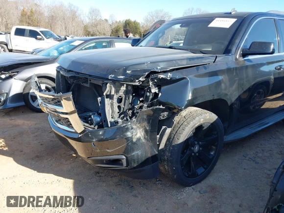 2015 Chevrolet Tahoe LT with VIN 1GNSCBKC5FR156050, listed as a IAAI auction lot 41486815 with 220,599 mi miles and . Bid and sale history available at DreamBid. Image 6.