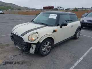2011 MINI Hardtop with VIN WMWSU3C50BT093428, listed as a IAAI auction lot 41895788 with 173,501 mi miles and . Bid and sale history available at DreamBid. Image 2.