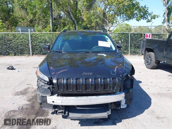 2016 Jeep Cherokee Latitude with VIN 1C4PJLCB6GW184264, listed as a IAAI auction lot 41783299 with 187,767 mi miles. Bid and sale history available at carsss.com. Image 12.