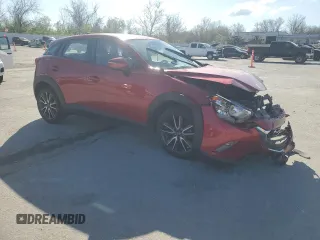 2017 Mazda CX-3 Touring z VIN JM1DKDC75H0170331, wystawiony jako Copart lot #51997455 z przebiegiem 141 405 mil mil oraz Szkoda całkowita • Salvage title. Historia ofert i sprzedaży dostępna na DreamBid. Obrazek 4.