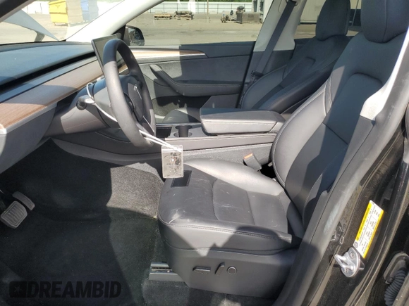 2024 Tesla Model Y with VIN 7SAYGDED0RF131495, listed as a Copart auction lot 56849765 with 10,120 mi miles and Salvage title. Bid and sale history available at DreamBid. Image 7.