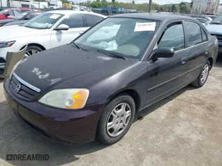 2001 Honda Civic LX with VIN 2HGES165X1H581899, listed as a IAAI auction lot 41989387 with 183,935 mi miles. Bid and sale history available at carsss.com. Image 2.