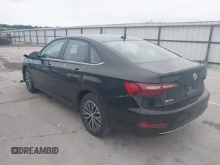 2021 Volkswagen Jetta S z VIN 3VWC57BU5MM008733, wystawiony jako IAAI lot #42527371 z przebiegiem 76 548 mil mil oraz . Historia ofert i sprzedaży dostępna na DreamBid. Obrazek 3.