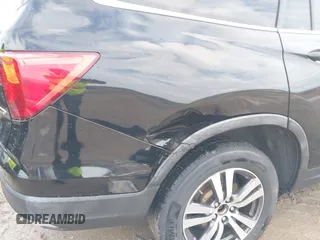2016 Honda Pilot EX-L with VIN 5FNYF6H5XGB031594, listed as a IAAI auction lot 40409867 with 132,227 mi miles. Bid and sale history available at carsss.com. Image 6.
