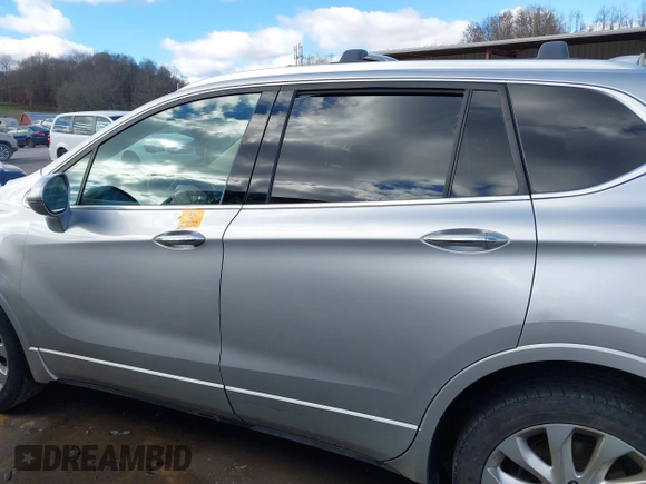 2017 Buick Envision Premium I with VIN LRBFXESX1HD195767, listed as a IAAI auction lot 40829131 with 114,690 mi miles and . Bid and sale history available at DreamBid. Image 14.