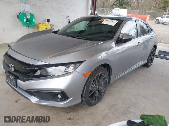 2021 Honda Civic Sport with VIN 2HGFC2F83MH521470, listed as a IAAI auction lot 41828890 with 49,703 mi miles and . Bid and sale history available at DreamBid. Image 17.