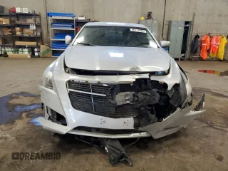 2014 Cadillac CTS AWD z VIN 1G6AW5SX9E0176985, wystawiony jako Copart lot #45111495 z przebiegiem 50 050 mil mil oraz Szkoda całkowita • Salvage title. Historia ofert i sprzedaży dostępna na DreamBid. Obrazek 5.