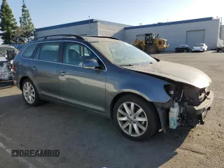 2014 Volkswagen Jetta SportWagen TDI w/Sunroof & Nav with VIN 3VWPL7AJ0EM606308, listed as a Copart auction lot 72995214 with 105,717 mi miles and Salvage Title. Bid and sale history available at carsss.com. Image 4.