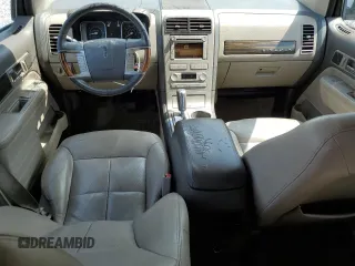 2007 Lincoln MKX z VIN 2LMDU68C17BJ35276, wystawiony jako Copart lot #56134445 z przebiegiem 213 181 mil mil oraz Szkoda całkowita • Salvage title. Historia ofert i sprzedaży dostępna na DreamBid. Obrazek 8.