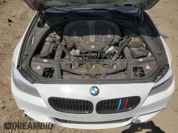 2013 BMW 5 Series 550i xDrive with VIN WBAFU9C52DDY71651, listed as a Copart auction lot 52156465 with 144,211 mi miles and Salvage title. Bid and sale history available at DreamBid. Image 12.