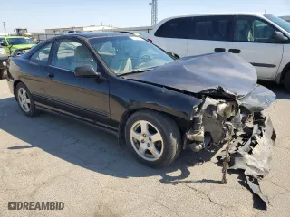 1999 Acura Integra LS with VIN JH4DC4450XS011986, listed as a Copart auction lot 72656914 with 197,567 mi miles and Salvage Title. Bid and sale history available at carsss.com. Image 4.