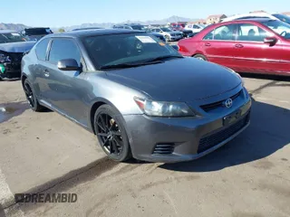 2013 Scion tC with VIN JTKJF5C70D3052816, listed as a IAAI auction lot 41828796 with 114,065 mi miles. Bid and sale history available at carsss.com. Image 1.