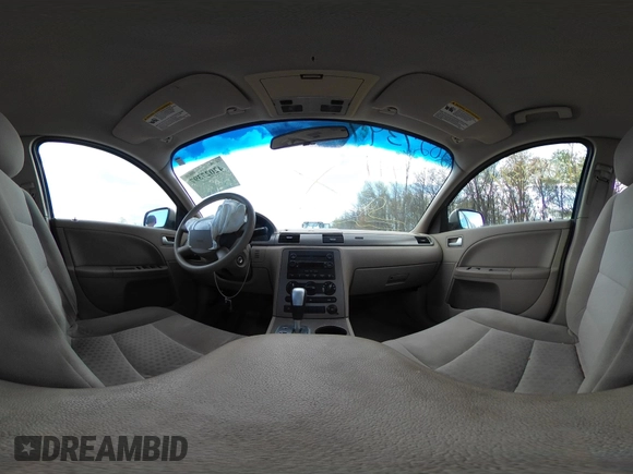2005 Ford Five Hundred SE z VIN 1FAFP23115G121341, wystawiony jako IAAI lot #42027397 z przebiegiem 110 851 mil mil oraz . Historia ofert i sprzedaży dostępna na DreamBid. Obrazek 24.