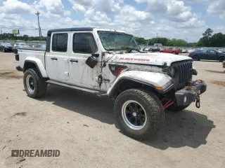 2020 Jeep Gladiator Sport S z VIN 1C6JJTAG3LL215977, wystawiony jako Copart lot #55012635 z przebiegiem Nie podano mil oraz Szkoda całkowita • Salvage title. Historia ofert i sprzedaży dostępna na DreamBid. Obrazek 4.