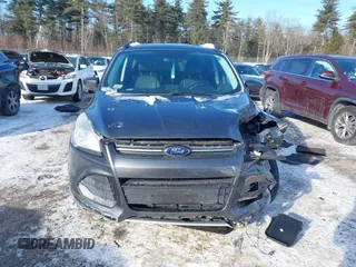 2016 Ford Escape SE with VIN 1FMCU9GX1GUC32307, listed as a IAAI auction lot 41395399 with 142,664 mi miles. Bid and sale history available at carsss.com. Image 12.