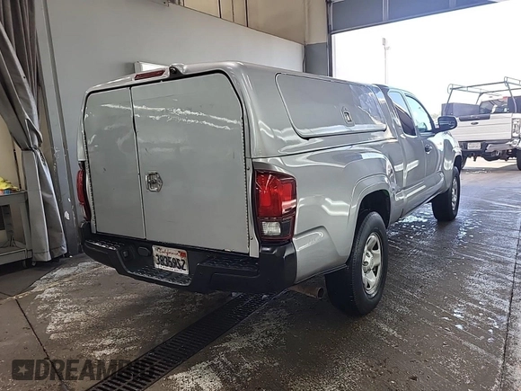 2019 Toyota Tacoma SR with VIN 5TFRX5GN1KX143485, listed as a IAAI auction lot 42763045 with 90,847 mi miles and . Bid and sale history available at DreamBid. Image 5.