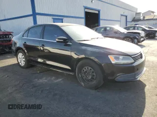 2014 Volkswagen Jetta SE z VIN 3VWD07AJ3EM354078, wystawiony jako Copart lot #63523535 z przebiegiem 137 118 mil mil oraz Czysty tytuł • Clean title. Historia ofert i sprzedaży dostępna na DreamBid. Obrazek 4.