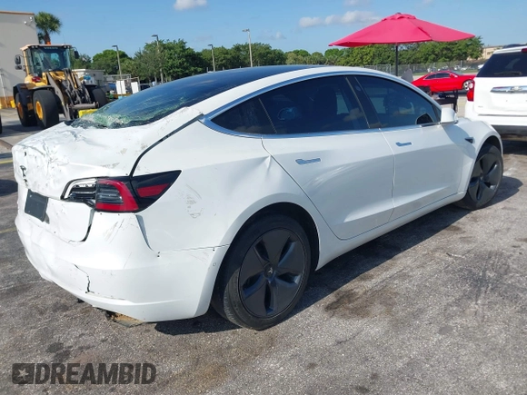 2020 Tesla Model 3 Standard Range Plus with VIN 5YJ3E1EA6LF799620, listed as a IAAI auction lot 42221643 with 55,458 mi miles and . Bid and sale history available at carsss.com. Image 4.