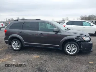 2017 Dodge Journey SXT with VIN 3C4PDCBB1HT612273, listed as a IAAI auction lot 41664445 with 122,069 mi miles and . Bid and sale history available at DreamBid. Image 13.