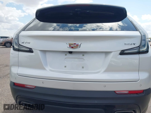 2022 Cadillac XT4 FWD Sport with VIN 1GYFZER44NF164899, listed as a IAAI auction lot 42152554 with 8,058 mi miles and . Bid and sale history available at DreamBid. Image 17.