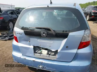 2009 Honda Fit with VIN JHMGE88209S052443, listed as a IAAI auction lot 42406572 with 140,343 mi miles and . Bid and sale history available at DreamBid. Image 15.