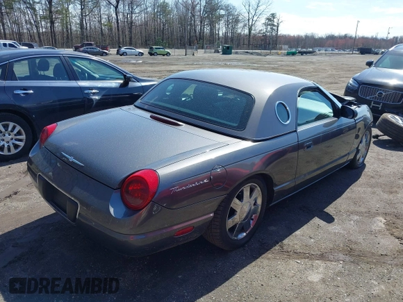 2003 Ford Thunderbird Deluxe z VIN 1FAHP60A23Y101899, wystawiony jako IAAI lot #41805269 z przebiegiem Nie podano mil oraz . Historia ofert i sprzedaży dostępna na DreamBid. Obrazek 4.