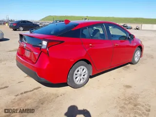 2022 Toyota Prius L Eco with VIN JTDKAMFU0N3161557, listed as a IAAI auction lot 41760623 with 135,934 mi miles. Bid and sale history available at carsss.com. Image 4.