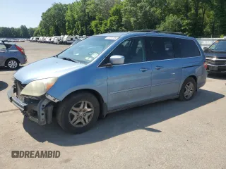 2006 Honda Odyssey EX with VIN 5FNRL38426B064803, listed as a Copart auction lot 61617705 with 264,886 mi miles and Salvage title. Bid and sale history available at DreamBid. Image 1.