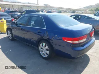 2003 Honda Accord LX with VIN JHMCM56353C063225, listed as a IAAI auction lot 42432611 with 202,916 mi miles and . Bid and sale history available at DreamBid. Image 3.