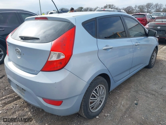 2014 Hyundai Accent GS with VIN KMHCT5AE1EU147015, listed as a IAAI auction lot 41659497 with 147,832 mi miles. Bid and sale history available at carsss.com. Image 4.