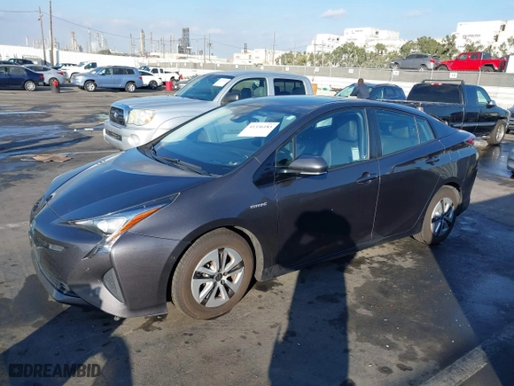 2017 Toyota Prius Two with VIN JTDKARFUXH3535139, listed as a IAAI auction lot 41336183 with 129,362 mi miles. Bid and sale history available at carsss.com. Image 17.
