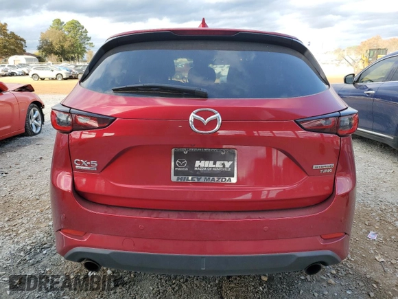2023 Mazda CX-5 Signature with VIN JM3KFBXY4P0100652, listed as a Copart auction lot 82235664 with 29,344 mi miles and Salvage Title. Bid and sale history available at carsss.com. Image 6.
