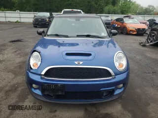 2013 MINI Hardtop S with VIN WMWSV3C55DT387777, listed as a Copart auction lot 56495215 with 53,033 mi miles and Salvage title. Bid and sale history available at DreamBid. Image 5.