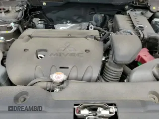 2018 Mitsubishi Outlander SE z VIN JA4AP3AW8JU026158, wystawiony jako Copart lot #65978965 z przebiegiem 45 607 mil mil oraz Szkoda całkowita • Salvage title. Historia ofert i sprzedaży dostępna na DreamBid. Obrazek 14.
