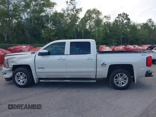 2014 Chevrolet Silverado 1500 High Country with VIN 3GCUKTEC4EG401571, listed as a IAAI auction lot 41984349 with 104,221 mi miles and . Bid and sale history available at DreamBid. Image 14.