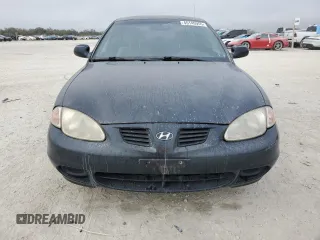 2000 Hyundai Elantra GLS z VIN KMHJF35F9YU032902, wystawiony jako Copart lot #45145955 z przebiegiem 79 229 mil mil oraz Czysty tytuł • Clean title. Historia ofert i sprzedaży dostępna na DreamBid. Obrazek 5.