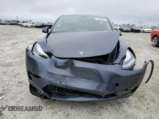 2021 Tesla Model Y Long Range z VIN 5YJYGDEE0MF254020, wystawiony jako Copart lot #51666865 z przebiegiem 25 805 mil mil oraz Szkody całkowita. Historia ofert i sprzedaży dostępna na DreamBid. Obrazek 5.