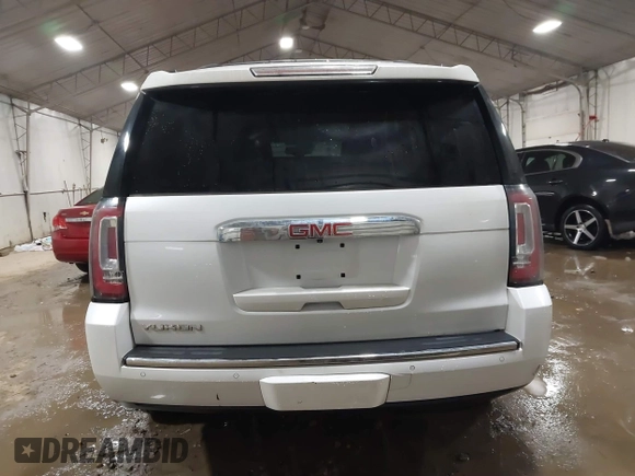 2016 GMC Yukon Denali with VIN 1GKS2CKJXGR271605, listed as a IAAI auction lot 41269124 with 172,432 mi miles. Bid and sale history available at carsss.com. Image 16.