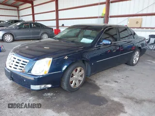 2007 Cadillac DTS Luxury I z VIN 1G6KD57Y17U160951, wystawiony jako IAAI lot #42298405 z przebiegiem 137 899 mil mil oraz . Historia ofert i sprzedaży dostępna na DreamBid. Obrazek 2.