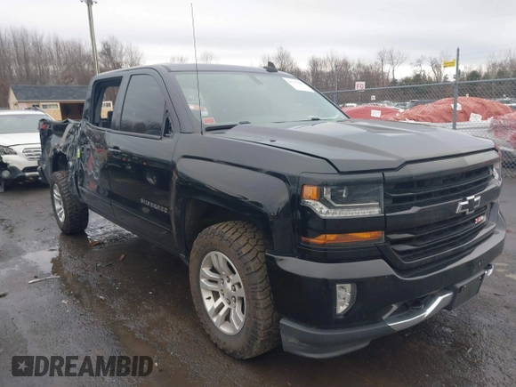 2018 Chevrolet Silverado 1500 LT with VIN 3GCUKREC5JG460979, listed as a IAAI auction lot 41741667 with 122,931 mi miles. Bid and sale history available at carsss.com. Image 1.