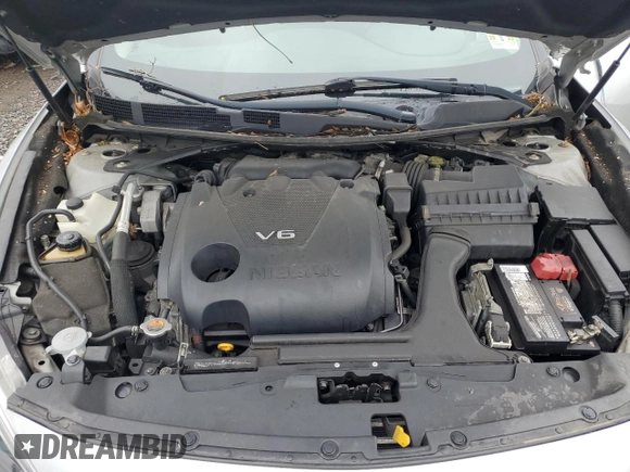 2016 Nissan Maxima SV z VIN 1N4AA6AP1GC431011, wystawiony jako Copart lot #56824955 z przebiegiem 103 668 mil mil oraz Szkoda całkowita • Salvage title. Historia ofert i sprzedaży dostępna na DreamBid. Obrazek 11.