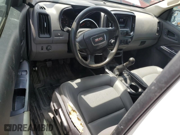2015 GMC Canyon with VIN 1GTH51EA9F1263487, listed as a Copart auction lot 64905974 with 123,596 mi miles and Clean title. Bid and sale history available at DreamBid. Image 8.