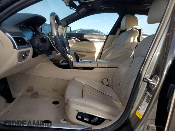 2016 BMW 7 Series 740i z VIN WBA7E2C53GG504611, wystawiony jako Copart lot #42253395 z przebiegiem 35 965 mil mil oraz Szkoda całkowita • Salvage title. Historia ofert i sprzedaży dostępna na DreamBid. Obrazek 7.